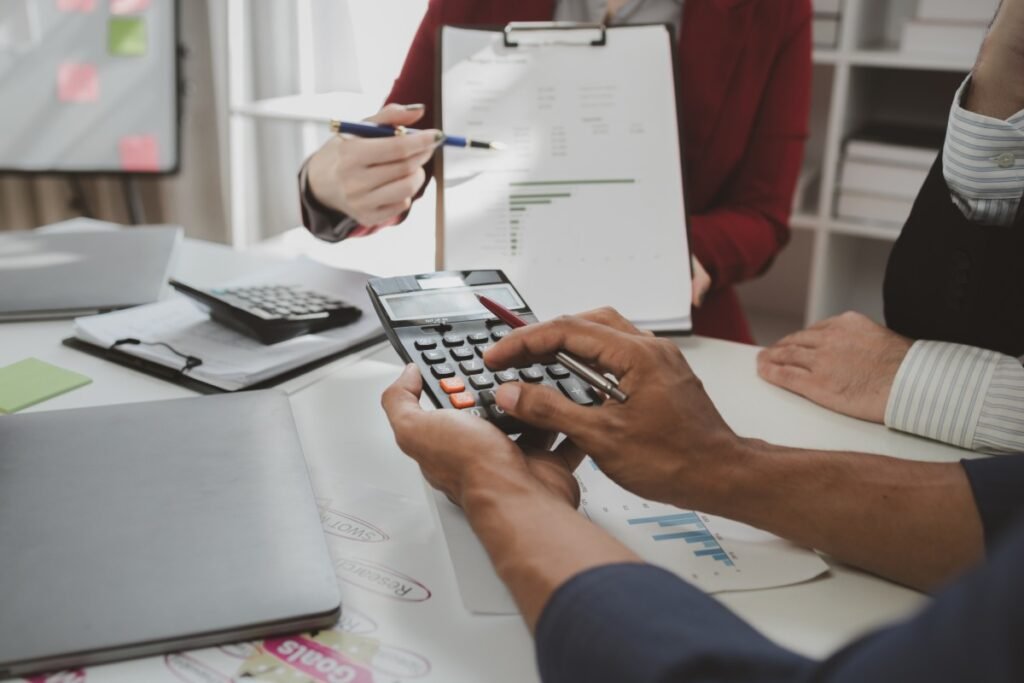 Your first year end accounts can feel complicated when you have spent the year focused on winning customers, delivering work and keeping the business running. However, preparing your records early can make the accounting process much easier and help you avoid last minute problems. For a UK limited company, annual accounts are prepared from the company’s financial records at the end of its financial year. These accounts report the company’s financial position and performance and are used for reporting to Companies House and HMRC. The first year can be particularly important because you are establishing the accounting systems and habits that you will use in future years. Getting the basics right now can make every subsequent year end more straightforward. Whether you have recently incorporated a limited company or are approaching your first accounting year end, this guide explains what to prepare, what records to check and how to work effectively with your accountant. What Are First Year End Accounts? Year end accounts are financial statements prepared for a business at the end of its accounting period. For a limited company, statutory accounts generally include a balance sheet and profit and loss account, together with relevant notes and other information depending on the company’s size and circumstances. The profit and loss account shows the company’s income, costs and resulting profit or loss during the accounting period. The balance sheet provides a snapshot of what the company owns, what it owes and what is owed to it at the end of the financial year. These figures are not simply a summary of your bank balance. Your accountant may need to make year end adjustments so the accounts accurately reflect the company’s financial position. When Is Your First Accounting Year End? One of the first things to establish is your company’s accounting reference date. When a company is incorporated, Companies House normally sets its first accounting reference date as the last day of the month in which the anniversary of incorporation falls. For example, if your company was incorporated on 15 September 2025, its first accounting reference date would normally be 30 September 2026. Your first accounts can therefore cover more than 12 months. GOV.UK gives the example of a company incorporated on 11 May whose first accounts cover the period from incorporation until 31 May of the following year. Do not assume that your first year end is simply 12 months after you started trading. Check the company’s accounting reference date and the relevant Corporation Tax accounting period. What Is the Difference Between Accounts and Your Tax Return? It is easy for a new business owner to assume that year end accounts and the Corporation Tax return are exactly the same thing. They are closely connected, but they are not identical. Your company accounts describe the company’s financial performance and position. The Corporation Tax return uses the relevant accounting information to calculate the company’s taxable profit and Corporation Tax position. There are also different filing deadlines. For a private limited company, annual accounts normally need to be filed with Companies House within nine months of the financial year end. Corporation Tax is normally due nine months and one day after the end of the Corporation Tax accounting period, while the Company Tax Return is normally due within 12 months of the end of that accounting period. This is why knowing your dates early matters. First Year End Accounts Checklist Before sending your records to an accountant, work through a basic year end checklist. 1. Make Sure All Sales Are Recorded Start by checking that every sale made during the accounting period has been recorded. Look at your: Sales invoices Receipts Card payments Cash sales Online payments Ecommerce platforms Customer refunds Credit notes If you invoice customers, compare your bookkeeping records against your invoicing system. If you operate an ecommerce business, do not rely solely on the amount that reaches your bank account. Platform fees, refunds, payment processing charges and other deductions can mean that bank deposits do not represent your gross sales. The aim is to establish a complete and accurate record of business income. 2. Reconcile Your Business Bank Account Bank reconciliation should be one of the most important parts of your first year end preparation. Compare the transactions recorded in your accounting software with the actual bank statements. Look for: Missing transactions Duplicate transactions Unexplained payments Unrecorded bank charges Transfers entered incorrectly Customer payments that have not been matched Payments made personally on behalf of the company Ideally, your bookkeeping should already be reconciled regularly. If it has not been, year end is a good opportunity to bring the records up to date. For a limited company, keeping company finances separate from personal finances is particularly important because the company is a separate legal entity. GOV.UK recommends keeping business banking separate from personal banking. 3. Check Your Business Expenses Go through your expenses and make sure they are properly recorded and supported by appropriate documentation. Common categories may include: Office costs Software subscriptions Professional fees Advertising Travel Business insurance Equipment Telephone and internet costs Rent Training Stock and materials Do not assume that every expense paid from a business bank account automatically receives the same tax treatment. Your accountant can review the transactions and determine how they should be treated in the accounts and tax computation. 4. Gather Your Receipts and Invoices Your bookkeeping entries should be supported by appropriate evidence. For example, a bank statement can show that £500 left your account, but it may not explain whether the payment was for advertising, equipment, personal spending or something else. Keep supplier invoices, receipts, contracts, payment confirmations and other relevant documents. Companies are required to maintain accounting records that show and explain their transactions, including money received and spent, assets and liabilities. 5. Review Outstanding Customer Invoices If customers still owe your company money at the year end, make sure your accounting records show the outstanding amounts. Create a list of unpaid invoices and check whether the amounts are still recoverable. This can help your accountant determine the correct year end treatment. It can also give you a useful snapshot of your company’s debtor position. A business can be profitable on paper while experiencing cash flow pressure because customers have not yet paid their invoices. 6. Check What You Owe Suppliers The same principle applies to supplier invoices. You may have received goods or services before the year end but not yet paid the supplier. Make sure these outstanding amounts are identified. Your accountant may need this information when preparing the year end accounts. This is one reason why simply looking at your bank balance is not enough to understand your company’s financial position. 7. Review Stock If your business holds stock, you should establish the stock position at the year end. This can include: Products held for sale Raw materials Packaging Components Work in progress Accurate stock information can affect the figures reported in your accounts. Companies that deal in goods have specific record keeping requirements around stock and stocktaking. For a growing retail or ecommerce business, a proper year end stock process can therefore be particularly important. 8. Record Business Assets Make a list of significant assets owned by the company. These might include: Computers Machinery Vehicles Furniture Specialist equipment Fixtures Other long term business assets Include information such as the purchase date, cost and relevant supporting documentation. Your accountant can then determine the appropriate accounting treatment and whether capital allowances or other tax considerations may apply. 9. Check Company Loans and Finance If you borrowed money to start or expand the company, provide details of the finance arrangements. This could include: Business loans Director loans Hire purchase Asset finance Overdrafts Other financing arrangements Provide loan statements where available. The year end accounts need to reflect relevant liabilities and balances accurately. 10. Review the Director’s Loan Account If you are a company director and have taken money from the company or personally paid company expenses, the director’s loan account may need attention. This is an area where new company owners can easily become confused because company money and personal money should not simply be treated as interchangeable. Give your accountant complete information about money you have taken from or paid into the company. Do not attempt to hide or ignore unusual transactions. A complete record allows the correct accounting and tax treatment to be considered. What Documents Should You Give Your Accountant? The exact information required depends on the business, but a useful first year end pack can include: Document or Information Why It Matters Business bank statements Supports bank reconciliation Sales invoices Supports recorded income Purchase invoices Supports business expenditure Receipts Provides evidence of costs VAT returns Helps reconcile VAT balances Payroll reports Supports wages and payroll liabilities Loan statements Supports finance balances Asset purchase details Helps identify business assets Stock valuation Supports year end stock figures Debtor list Shows amounts owed to the company Creditor list Shows amounts owed by the company Ecommerce reports Helps reconcile online sales Director loan information Supports director related balances Previous accounting information Helps establish opening balances The better organised this information is, the easier it is for your accountant to identify discrepancies and prepare the accounts efficiently. What Year End Adjustments Might Be Needed? Your bookkeeping records are not necessarily the final accounts. An accountant may need to make adjustments so the accounts reflect the correct accounting period and financial position. These can include: Accruals An accrual may be needed where the company has received a service or incurred a cost before year end but has not yet received or paid the relevant invoice. Prepayments A prepayment can arise when a business has paid for something in advance that relates partly to a future accounting period. Depreciation Certain business assets may need to be accounted for over their useful economic life rather than treating the entire purchase price as an immediate accounting expense. Bad Debts If a customer balance is unlikely to be recovered, your accountant may need to consider the appropriate treatment. Stock Adjustments If the company holds stock, the year end accounts may need to reflect the appropriate stock figure. Corporation Tax The accounts and tax computation need to be considered together so the company’s Corporation Tax position can be calculated correctly. These adjustments are one reason professional year end accounts preparation involves more than simply exporting a profit and loss report from accounting software. What Should a Small Business Do Before Its First Year End? The best preparation starts months before the deadline. A simple monthly routine can make the eventual year end process considerably easier. Keep Bookkeeping Up to Date Do not leave 12 months of transactions for your accountant to untangle at the end of the year. Update your records regularly. Monthly bookkeeping makes it easier to identify missing receipts, unusual transactions and discrepancies while they are still easy to investigate. Keep Business and Personal Spending Separate For a limited company, maintain a clear division between company and personal finances. GOV.UK states that because a company is a separate legal entity, there must be a clear division between the company’s finances and those of its owners and directors. A separate business bank account can make this much easier. Save Documents Digitally Instead of keeping receipts and invoices in different physical locations, use a consistent digital filing system. You could organise documents by: Month Supplier Expense category Project Financial year The exact system is less important than using it consistently. Review Your Accounts Monthly A monthly review can reveal issues before they become year end problems. Look at: Revenue Gross profit Operating costs Outstanding invoices Cash flow VAT Payroll Unusual transactions Director balances You do not need to be an accountant to benefit from understanding these numbers. What If Your Records Are Incomplete? Do not wait until the filing deadline if your records are missing information. Start by identifying the gaps. For example, you might discover: Three months of bank transactions have not been reconciled Several supplier invoices are missing Some customer invoices were never entered Personal transactions were mixed with company spending Ecommerce sales do not match bank deposits Stock records are incomplete The next step is to reconstruct the information using reliable evidence. Bank statements, supplier invoices, customer records, payment platform reports and accounting software can all help. Companies are required to keep accounting records that are sufficient to show and explain transactions and allow directors to ensure their accounts comply with relevant requirements. If you are dealing with several months of incomplete bookkeeping, professional help can save significant time and reduce the risk of submitting inaccurate figures. What Happens After Your First Year End Accounts Are Prepared? Once the accounts are prepared, the company may need to use them for several purposes. For a private limited company, statutory accounts generally need to be provided to shareholders and filed with Companies House and HMRC as part of the Company Tax Return. Your accounts can also help you understand: How profitable the business was How much the company owns How much it owes How much customers owe How much cash is available Whether expenses are increasing Whether the business is ready to grow This is where year end accounts become more than a compliance exercise. They provide a financial picture that can help you make better business decisions during the following year. What Are the First Year Accounts Deadlines? For many private limited companies, the standard deadline for filing annual accounts with Companies House is nine months after the financial year end. However, the first accounting period can have different rules. For a company's first accounts, if the accounts cover more than 12 months, a private company generally has 21 months from incorporation to deliver them to Companies House, subject to the applicable rules. Corporation Tax deadlines are separate. Corporation Tax is generally due nine months and one day after the end of the accounting period, while the Company Tax Return is generally due 12 months after the end of that accounting period. Because deadlines can depend on your company's specific circumstances, check the dates applicable to your company rather than relying on a generic calendar reminder. What Happens If You File Your Accounts Late? Late filing can result in penalties. Companies House explains that companies must file their accounts on time and that there can be serious consequences for failing to comply with filing responsibilities. The practical lesson is simple: do not wait until the deadline to discover that your bookkeeping is incomplete. Give yourself and your accountant enough time to investigate missing information, prepare the accounts, review the figures and file the necessary documents. Do Small Companies Need an Accountant for Year End Accounts? A company does not necessarily have to use a professional accountant to prepare its accounts. However, directors remain responsible for ensuring that the company meets its legal and reporting responsibilities. For a straightforward business, accounting software may help with day to day bookkeeping. However, year end accounts can involve adjustments, tax considerations, balance sheet items and filing requirements that are not always obvious to someone preparing accounts for the first time. An accountant can also provide a useful independent review of your records and identify issues before they become expensive problems. Accountancy Net provides accounting support for entrepreneurs, startups and established businesses, including bookkeeping, company accounts, VAT and payroll services. If you are approaching your first year end and want professional assistance, you can explore Accountancy Net's company accounts service. A Simple First Year End Preparation Timeline You do not need to wait until the final few weeks to prepare. Three Months Before Year End Review your bookkeeping. Check that all bank accounts are reconciled and identify missing transactions. Review outstanding customer invoices and supplier bills. One Month Before Year End Check stock if applicable. Review major asset purchases. Make sure loan statements and relevant finance documents are available. Check VAT and payroll records. At Year End Take the required stock information. Download or save relevant bank statements. Ensure sales and expenses are recorded up to the accounting date. Make a list of unusual or significant transactions. After Year End Send the complete information to your accountant. Respond promptly to questions. Review the draft accounts carefully. Confirm that the information is accurate before approval and filing. This approach is much easier than discovering missing records immediately before a filing deadline. First Year End Accounts: Common Mistakes to Avoid Leaving Bookkeeping Until the Last Minute Year end should be a review process, not the first time anyone looks at the bookkeeping in months. Treating the Bank Balance as Profit Your bank balance does not tell you your accounting profit. Money may relate to loans, VAT, unpaid invoices, capital purchases or other transactions. Mixing Personal and Company Expenses This makes reconciliation harder and can create confusion around director balances. Forgetting Outstanding Invoices Unpaid invoices can still be relevant to the accounts even if the customer has not paid. Ignoring Small Transactions A large number of small transactions can become significant when added together. Assuming Accounting Software Does Everything Software can improve record keeping, but it does not remove the need for accurate data and appropriate accounting decisions. Missing Filing Deadlines A well prepared set of accounts is only useful if it is filed correctly and on time. Frequently Asked Questions What should I prepare for my first year end accounts? Start with complete bookkeeping records, reconciled bank accounts, sales invoices, purchase invoices, receipts, VAT and payroll information, loan statements, asset details, stock information and details of outstanding debtors and creditors. How long after year end do small companies have to file accounts? For a private limited company, annual accounts generally need to reach Companies House within nine months of the financial year end. First accounts can have different deadlines depending on the company's incorporation date and accounting period. What do first year company accounts include? Statutory accounts generally include a balance sheet and profit and loss account, with notes and other components depending on the company's size and circumstances. Do I need an accountant for my first year end accounts? You are not always legally required to use an accountant. However, professional support can be useful when you are unfamiliar with accounting adjustments, Corporation Tax, Companies House requirements or your records are incomplete. What happens if my bookkeeping is not up to date? You should bring the records up to date before the accounts are prepared. Missing information can make it difficult to establish accurate income, expenses, assets, liabilities and tax calculations. What records must a small limited company keep? A company must maintain accounting records covering matters such as money received and spent, assets, liabilities and, where relevant, stock and goods bought and sold. It must also retain other information needed to prepare its accounts and Company Tax Return. Can my first year accounts cover more than 12 months? Yes. A company's first accounting period can be longer than 12 months because the first accounting reference date is normally linked to the month of incorporation. Prepare Your First Year End Accounts With Confidence Your first year end accounts do not need to become a stressful scramble. The key is to keep accurate records throughout the year, reconcile your accounts regularly, separate personal and company finances, retain supporting documents and understand your filing dates before the deadline approaches. If your business is approaching its first year end, now is a good time to review your bookkeeping and identify anything your accountant will need. Accountancy Net can support small businesses with bookkeeping and company accounts, helping you turn your financial records into properly prepared accounts and stay on top of your reporting responsibilities. You can contact Accountancy Net to discuss your accounting requirements and request a quote. You can also visit the Accountancy Net Google Business Profile to find the business and contact information.